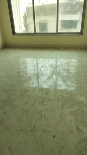 Living Room in 1 BHK Apartment at Kinjal Nine, Agripada – for Sale