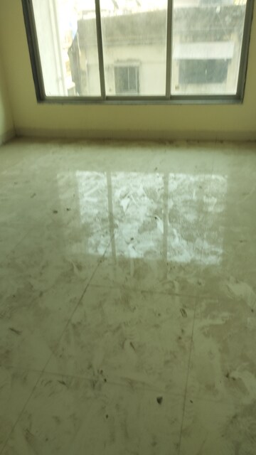 Living Room in 1 BHK Apartment at Kinjal Nine, Agripada – for Sale