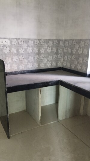 Kitchen in 1 BHK Apartment at Kinjal Nine, Agripada – for Sale