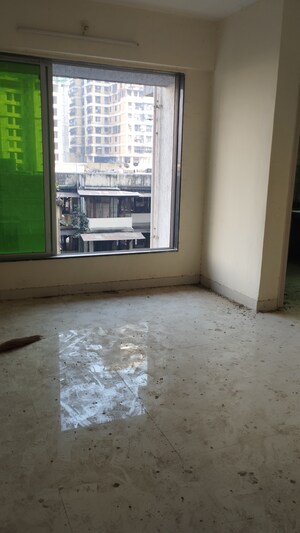 Living Room in 1 BHK Apartment at Kinjal Nine, Agripada – for Sale