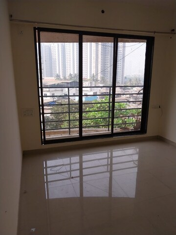 Room in 2 BHK Apartment at OM Elegance, Malad West – for Sale