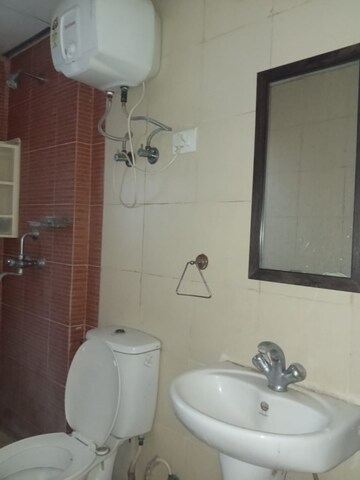 Bathroom in 3 BHK Apartment at Mahagun Mywoods, Sector 16c Greater Noida – for Rent