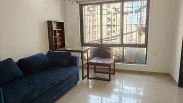 Living Room in 1 BHK Apartment at Panch Mahal, Powai – for Rent