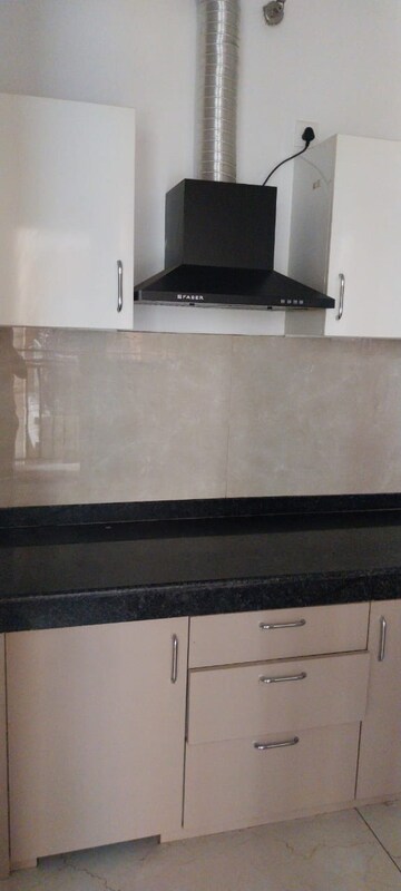 Kitchen in 2 BHK Apartment at Rishita Manhattan, Gomti Nagar – for Rent