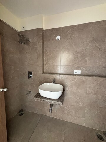 Bathroom in 1 BHK Apartment at Godrej Nest Kandivali, Kandivali East – for Rent