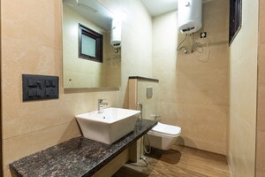 Bathroom in 3 BHK Builder Floor at South Extension – for Rent