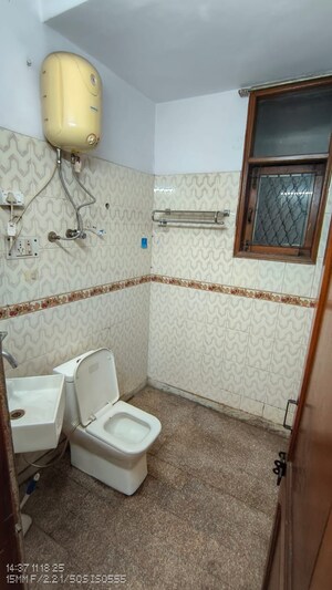 Bathroom in 2 BHK Builder Floor at Khirki Extension – for Rent