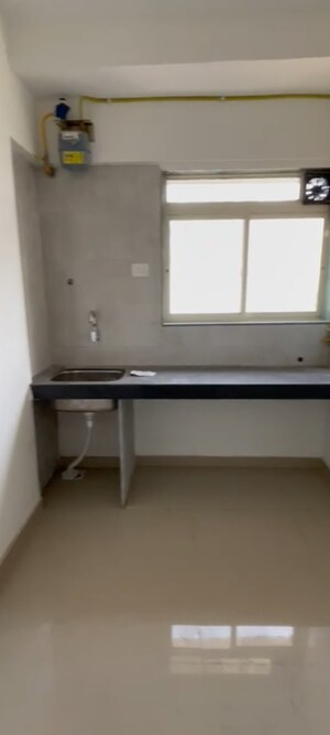 Kitchen in 1.5 BHK Apartment at Prabhadevi – for Rent