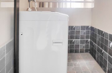 Bathroom in 2 BHK Apartment at Kohinoor Courtyard One, Wakad – for Rent