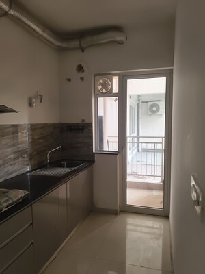 Kitchen in 2 BHK Apartment at Shapoorji Pallonji Joyville Phase 2, Sector 102 – for Rent