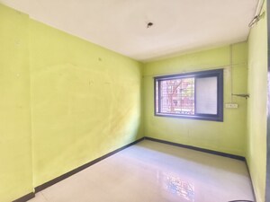 Room in 2 BHK Apartment at Malhar CHS Vasant Nagari, Vasant Nagari – for Sale