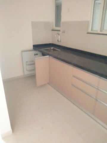 Kitchen in 3 BHK Apartment at Dorabjee Paradise Building A&B Condominium, Mohammadwadi – for Rent