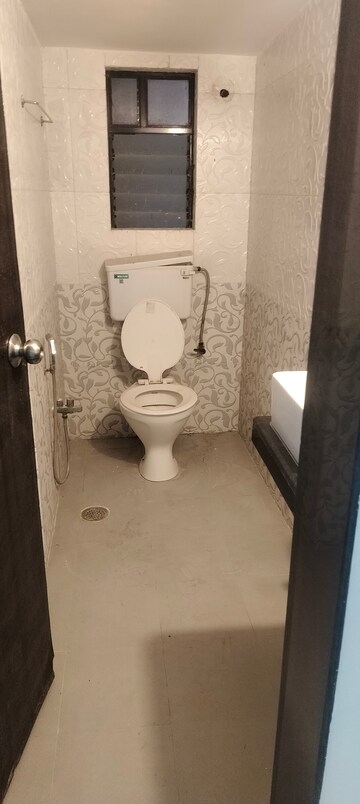 Bathroom in 2 BHK Apartment at Indra Darshan Apartment, Andheri West – for Rent