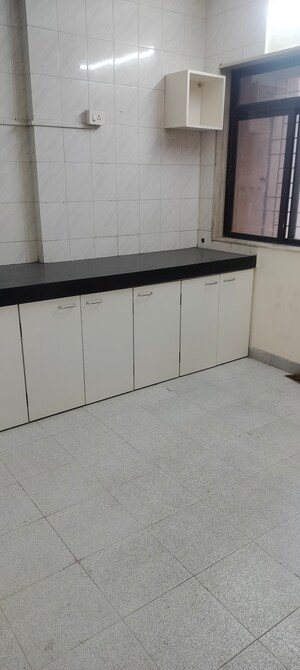 Kitchen in 2 BHK Apartment at Indra Darshan Apartment, Andheri West – for Rent