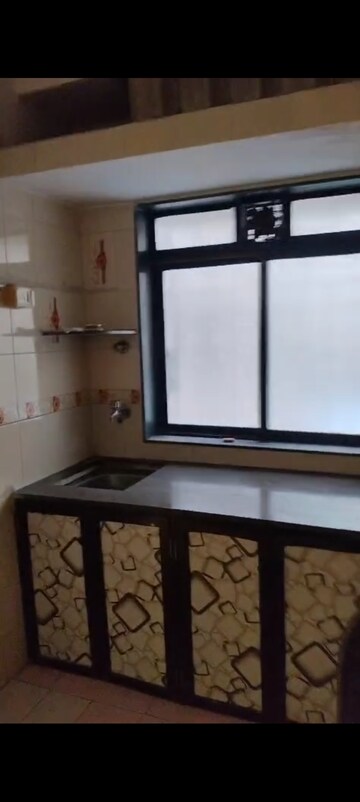 Kitchen in 1 BHK Apartment at Evergreen city, Mira Road – for Sale