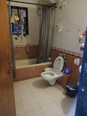 Bathroom in 2 BHK Apartment at Shreeji Paradise, Aundh – for Rent