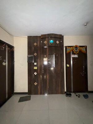 Living Room in 2 BHK Apartment at Om Prabhu Manohar CHS, Seawoods Sector 50 – for Rent
