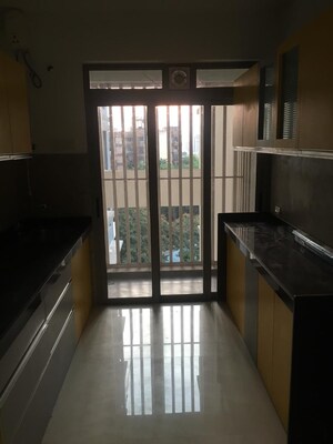 Kitchen in 3 BHK Apartment at Amar Kunj Goregaon West, Goregaon West – for Rent