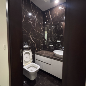 Bathroom in 4 BHK Builder Floor at Green Park Extension – for Rent