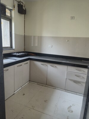 Kitchen in 1 BHK Apartment at Lodha Splendora, Ghodbunder Road – for Sale