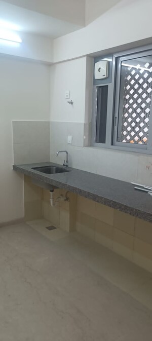 Kitchen in 2 BHK Apartment at Piramal Vaikunth, Balkum Pada – for Rent