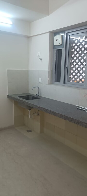 Kitchen in 2 BHK Apartment at Piramal Vaikunth, Balkum Pada – for Rent
