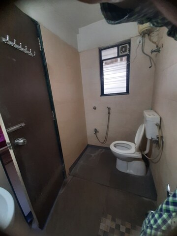 Bathroom in 2 BHK Apartment at Sawarkar Nagar – for Sale