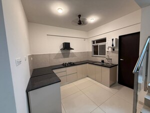 Kitchen in 2 BHK Apartment at Gera World of Joy, Kharadi – for Rent