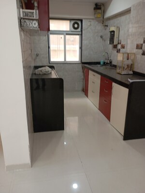 Kitchen in 1.5 BHK Apartment at Siv Akhand Anand, Andheri East – for Sale