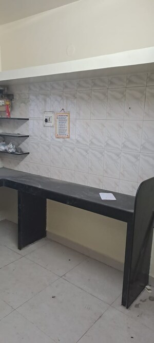 Kitchen in 2 BHK Apartment at Abhishek 6 CHS, Chinchwad – for Sale