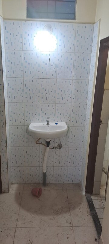 Bathroom in 2 BHK Apartment at Abhishek 6 CHS, Chinchwad – for Sale