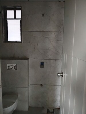 Bathroom in 3 BHK Apartment at OHM Omkar Enclave, Ranip – for Rent