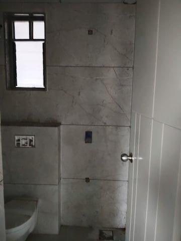 Bathroom in 3 BHK Apartment at OHM Omkar Enclave, Ranip – for Rent