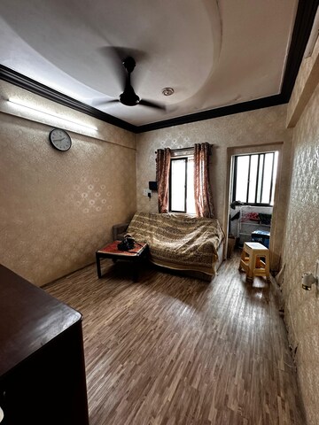 Living Room in 1 BHK Apartment at Vile Parle West – for Rent