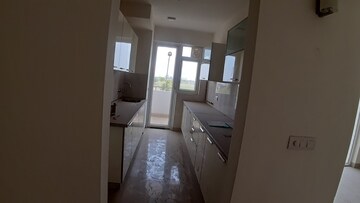 Kitchen in 3.5 BHK Apartment at Emaar Imperial Gardens, Sector 102 – for Sale