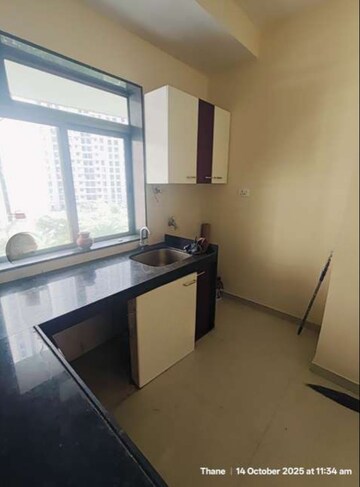 Kitchen in 2 BHK Apartment at Runwal Eirene Phase 2, Balkum Pada – for Sale