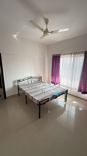 Bedroom in 2 BHK Apartment at Kolte Patil Aleria, Kharadi – for Rent