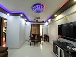 Living Room in 2 BHK Apartment at Om Prabhu Manohar CHS, Seawoods Sector 50 – for Rent