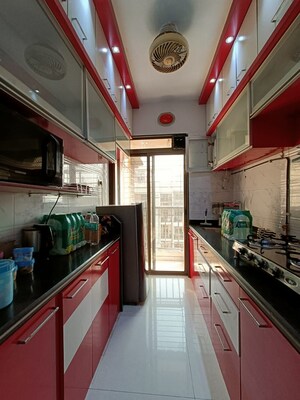 Kitchen in 2 BHK Apartment at Om Prabhu Manohar CHS, Seawoods Sector 50 – for Rent