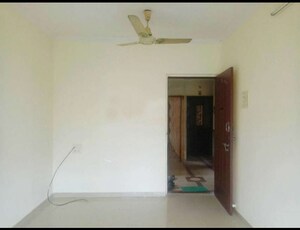 Room in 1 BHK Apartment at Puraniks Kavya Dhara CHS, Dhokali – for Rent