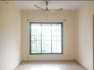 Room in 1 BHK Apartment at Puraniks Kavya Dhara CHS, Dhokali – for Rent