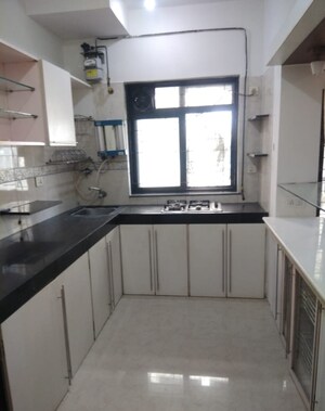 Kitchen in 2 BHK Apartment at K Raheja Palm Court, Malad West – for Sale
