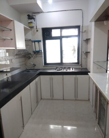 Kitchen in 2 BHK Apartment at K Raheja Palm Court, Malad West – for Sale