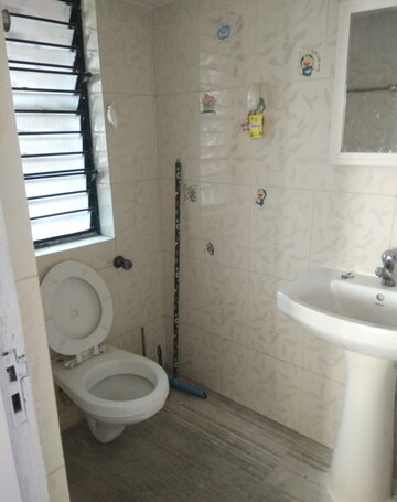 Bathroom in 2 BHK Apartment at K Raheja Palm Court, Malad West – for Sale
