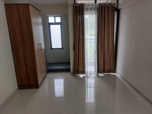 Living Room in 2 BHK Apartment at Mantra Montana Phase 1, Dhanori – for Rent