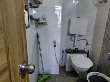 Bathroom in 2 BHK Apartment at Puranik City Reserva, Ghodbunder Road – for Rent