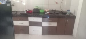 Kitchen in 1 BHK Apartment at Gulmohar Symphony, Kharadi – for Rent