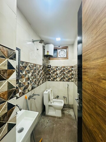 Bathroom in 2 BHK Builder Floor at Dwarka Mor – for Rent