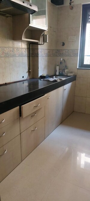 Kitchen in 2 BHK Apartment at K Raheja Palm Spring, Malad West – for Sale