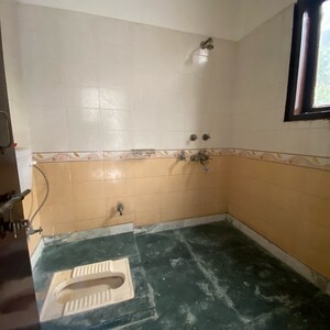 Bathroom in 2 BHK Builder Floor at Chattarpur – for Rent